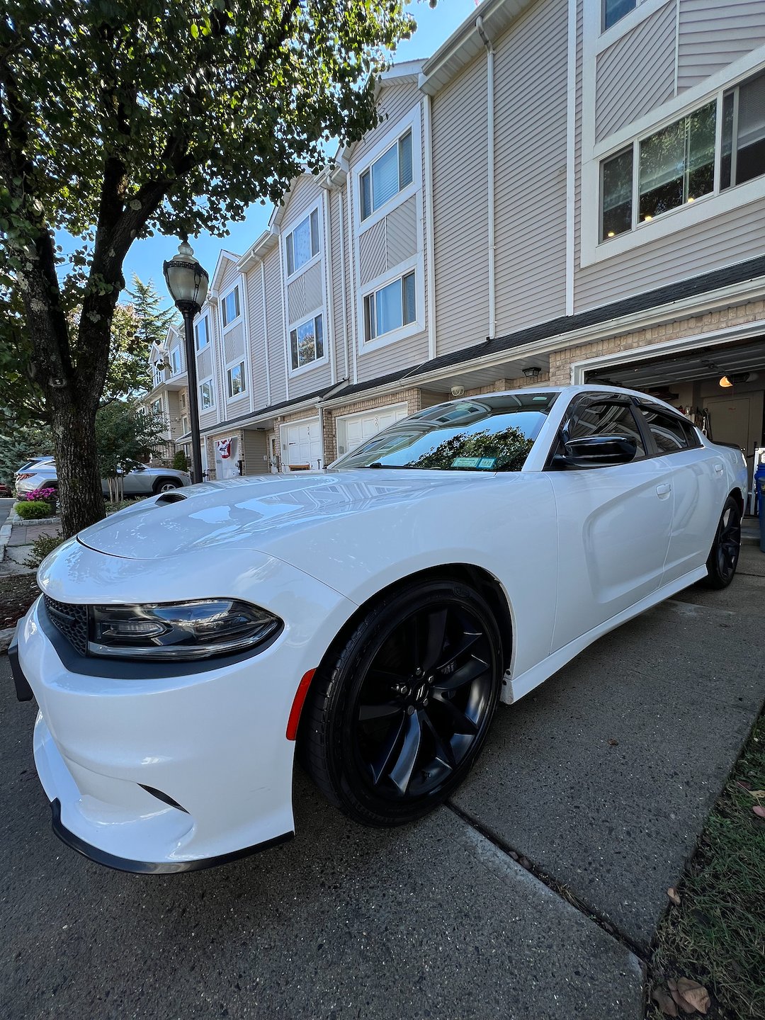 Drew’s Auto Detailing completed a immaculate full exterior detail for 2021 white Dodge Charger performed in Staten Island, New York 