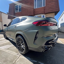 Drews-Auto-Detailing-recognized-as-Staten-Islands-leading-auto-detailing-company-recently-completed-an-exterior-full-detailing-on-a-stunning-2023-BMW-X6-M50-wrapped-in-matte-green-in-the-Annadale-neighborhood-of-Staten-Island 1